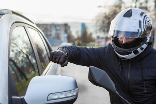 In most cases, one or two people accost your vehicle at a slow turning, pick a fight with you on some pretext and try to escalate the situation amid your confused protests. Their ultimate goal is to rob you. (Representative image/Shutterstock)